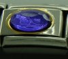 Purple oval stone with gold rim - enamel charm